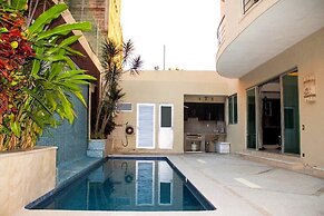 Apartments with Shared Pool and BBQ