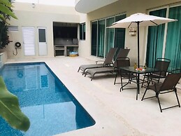 Apartments with Shared Pool and BBQ