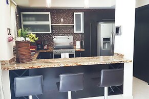 Apartments with Shared Pool and BBQ