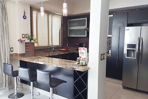 Apartments with Shared Pool and BBQ