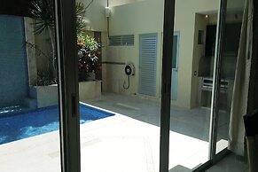 Apartments with Shared Pool and BBQ