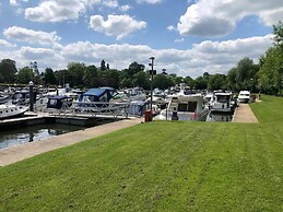 Riverside Boat Retreat on the River Thames