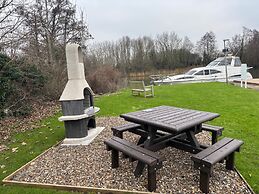 Riverside Boat Retreat on the River Thames