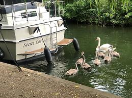 Riverside Boat Retreat on the River Thames