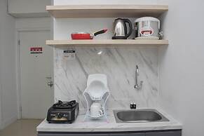 Cozy Style 2BR at Green Pramuka City Apartment