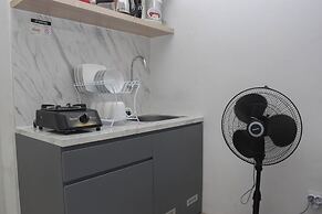 Cozy Style 2BR at Green Pramuka City Apartment
