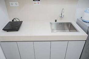 Minimalist and Serene 1BR at Bintaro Embarcadero Apartment