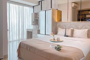 Homey and Restful Studio Grand Kamala Lagoon Apartment