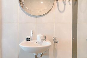 Homey and Restful Studio Grand Kamala Lagoon Apartment