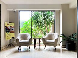 Modern Look and Restful Studio at Azalea Suites Apartment