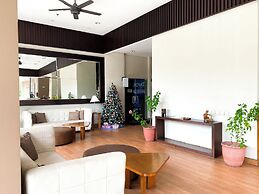 Modern Look and Restful Studio at Azalea Suites Apartment