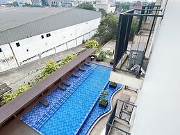 Modern Look and Restful Studio at Azalea Suites Apartment