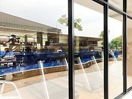 Modern Look and Restful Studio at Azalea Suites Apartment