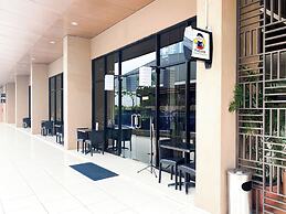 Modern Look and Restful Studio at Azalea Suites Apartment