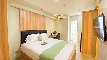 Comfy and Minimalist Studio at Bassura City Apartment