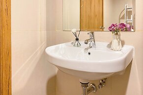 Cozy and Warm Studio at Gateway Park LRT City Bekasi Apartment