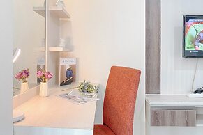 Modern Look Studio Apartment at Woodland Park Residence