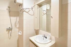 Modern Look Studio Apartment at Woodland Park Residence