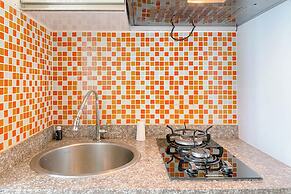 Modern Look Studio Apartment at Woodland Park Residence