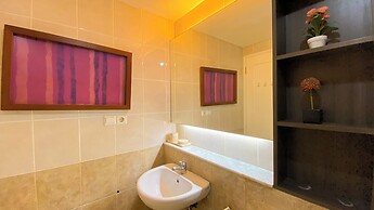 Modern Look 1BR Apartment at Silkwood Residence