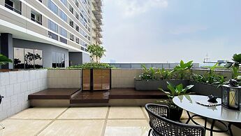 Elegant 2BR Loft Garden Villa at Collins Boulevard Apartment