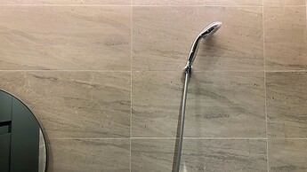 Elegant 2BR Loft Garden Villa at Collins Boulevard Apartment