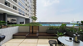 Elegant 2BR Loft Garden Villa at Collins Boulevard Apartment