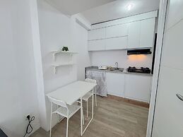 Compact and Restful 2BR at Menara Rungkut Apartment