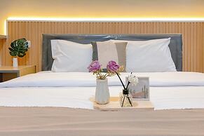 Restful and Homey Studio at Gateway Park LRT City Bekasi Apartment