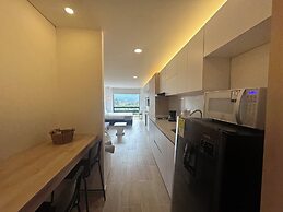 Apto con Jacuzzi Privado y vista verde