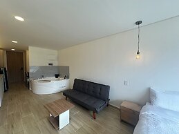 Apto con Jacuzzi Privado y vista verde