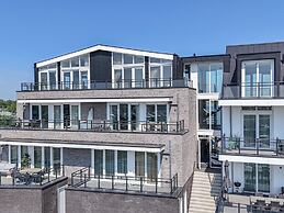 Lush Apartment With Water Views