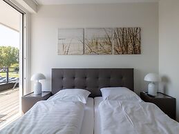 Lush Apartment With Water Views