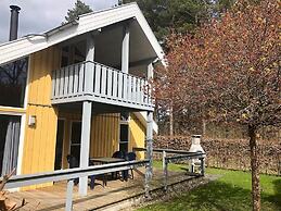 Ferienhaus mit Terrasse und Balkon