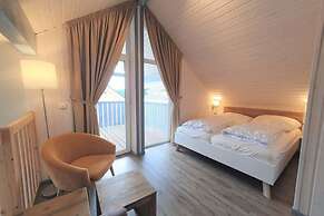 Ferienhaus mit Terrasse und Balkon