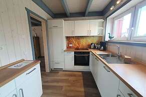 Ferienhaus mit Terrasse und Balkon