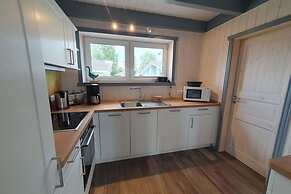 Ferienhaus mit Terrasse und Balkon