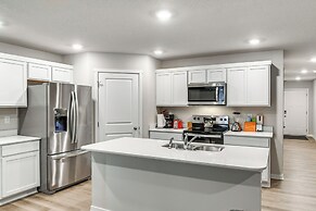 1 Mi to Golf: Quiet Waukee Home w/ Fireplace!