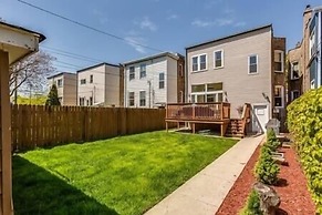 Logan Square Beauty with 2 Bedrooms w/Parking by AllSet Turnover