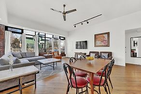 Bright Converted Storefront in Roscoe Village by AllSet Turnover