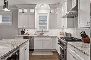 Elegantly Designed, Just Steps from Wrigley Field by AllSet Turnover