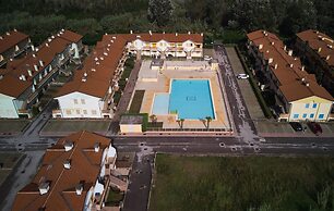 Relax and Enjoy Your Stay in Rosolina by the Pool