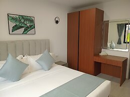 Hibiscus Suites And Residences