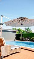 Hibiscus Suites And Residences