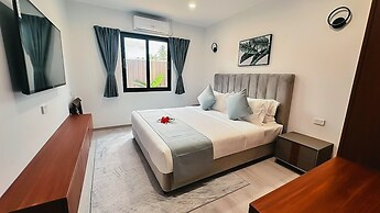 Hibiscus Suites And Residences