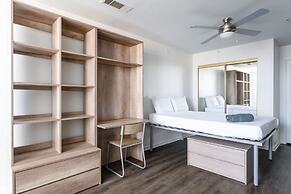 Modern Condo With Pool, Gym, Workspaces & BBQ