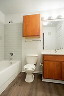 Modern Condo With Pool, Gym, Workspaces & BBQ