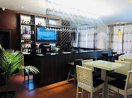 Tavern Luxury Hotel and Suites Ltd