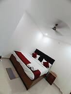 Goroomgo Kashi Grand Inn Varanasi