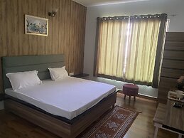 Hotel Nirmal - Budget Friendly Rooms near Fortis Hospital and Marriage